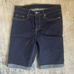 Levi's dark wash denim, capri jean shorts, medium mid rise